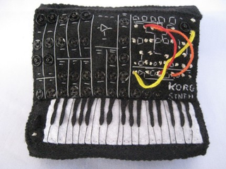 Illustration for article titled Miniature Synthesizer Replicas Cast in Felt Will Rock Your Tiny Mind